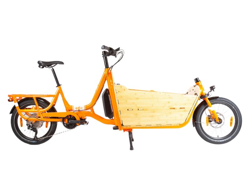 A orange Yuba Supercargo CL cargo bike