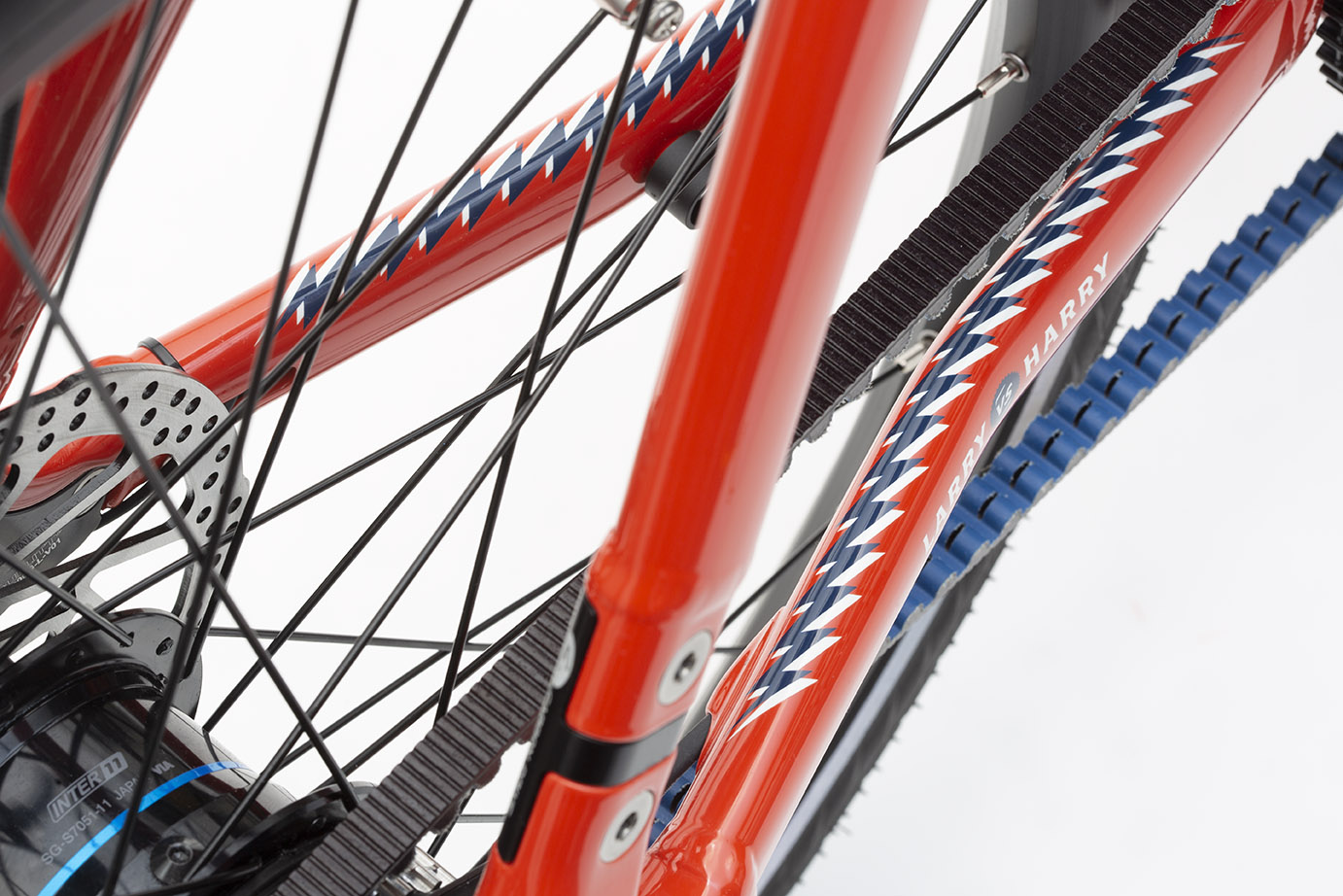 Close up of the belt drive of a Mayor Tom (red)  coloured Bullitt cargo bike 