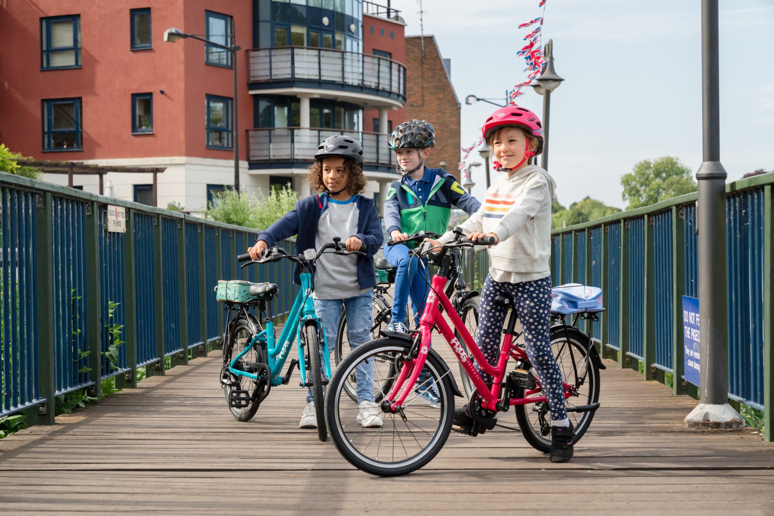 Children on Frog city bikes